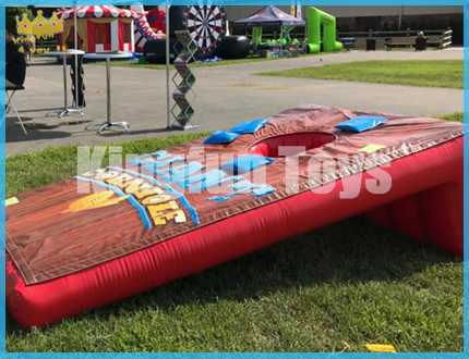 Inflatable cornhole game