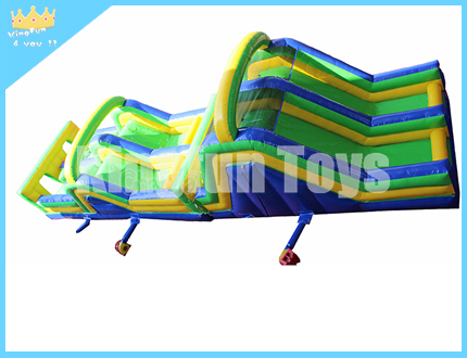 Green inflatable obstacle course
